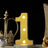 Illuminated number 1 marquee light with gold decor on black background