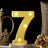 Yellow marquee number 7 with lights on a decorative table setting.