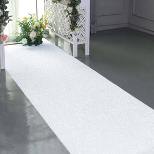 Decorative white aisle runner with sparkles for event decoration.