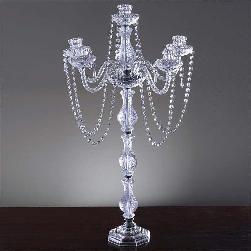 Elegant crystal candelabra with beaded accents and five candle holders.