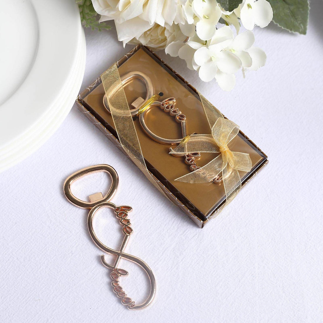 Rose gold infinity love bottle opener with gift box and ribbon.