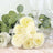 Yellow rose gift in heart-shaped box with a ribbon.