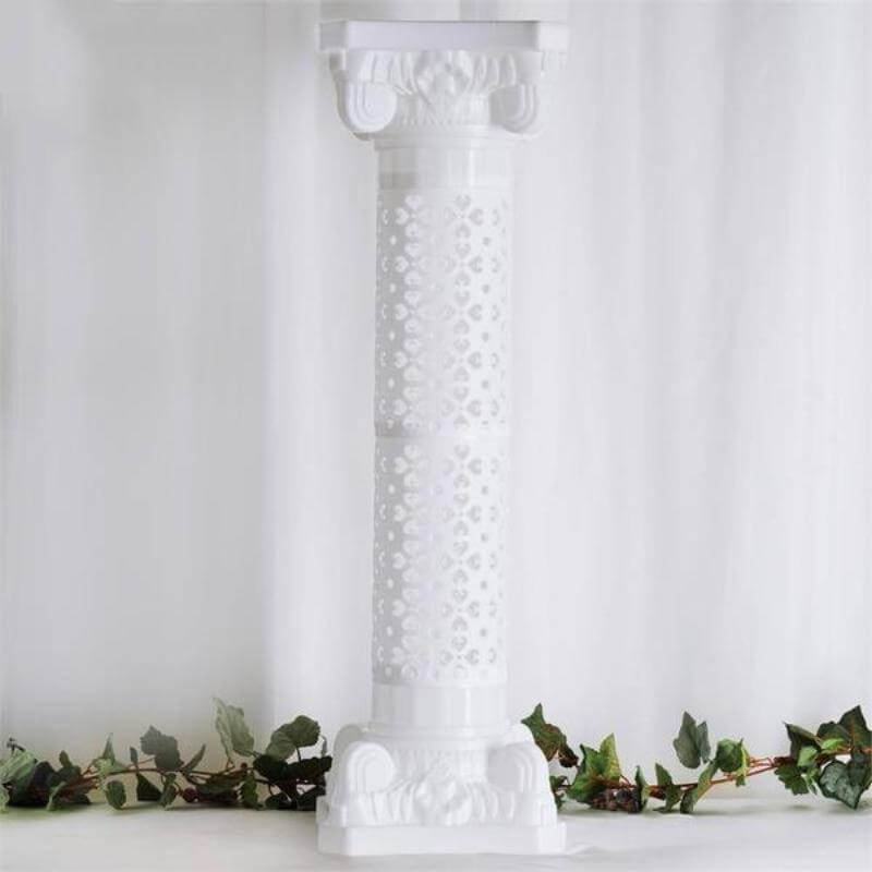 White decorative column with intricate patterns