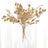 Dried gold leaf arrangement in a clear glass vase