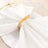 Bamboo napkin ring on white folded napkin, decorative table setting