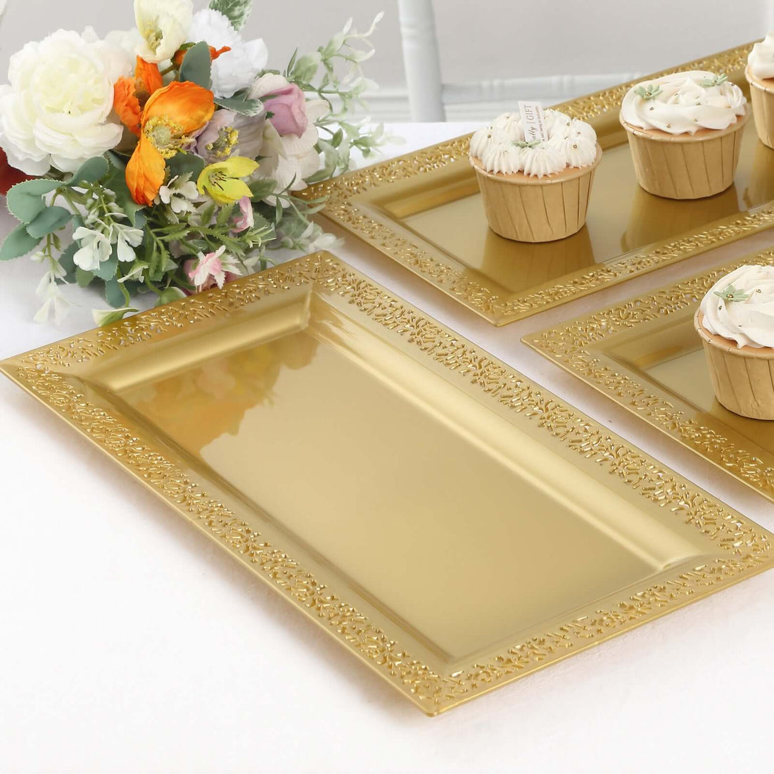 Gold decorative serving tray with floral design, ideal for events or gatherings.