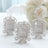 Set of elegant white photo frames with intricate designs on a soft background.