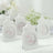 White decorative bottles with "For You" message on a plain background.