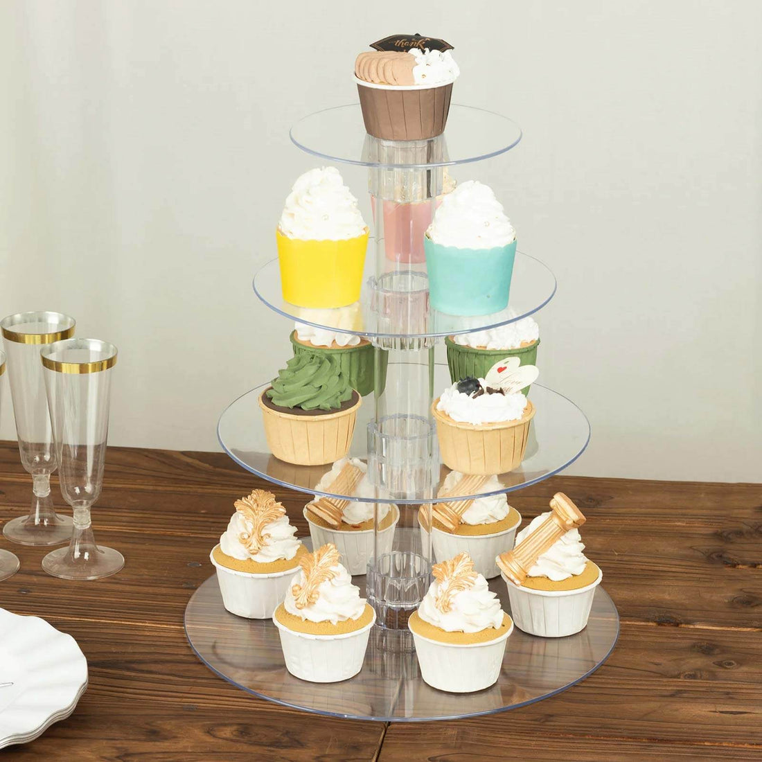 Cupcake stand with colorful cupcakes arranged in a tiered display.
