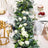 Elegant table centerpiece with artificial flowers and greenery, perfect for events.