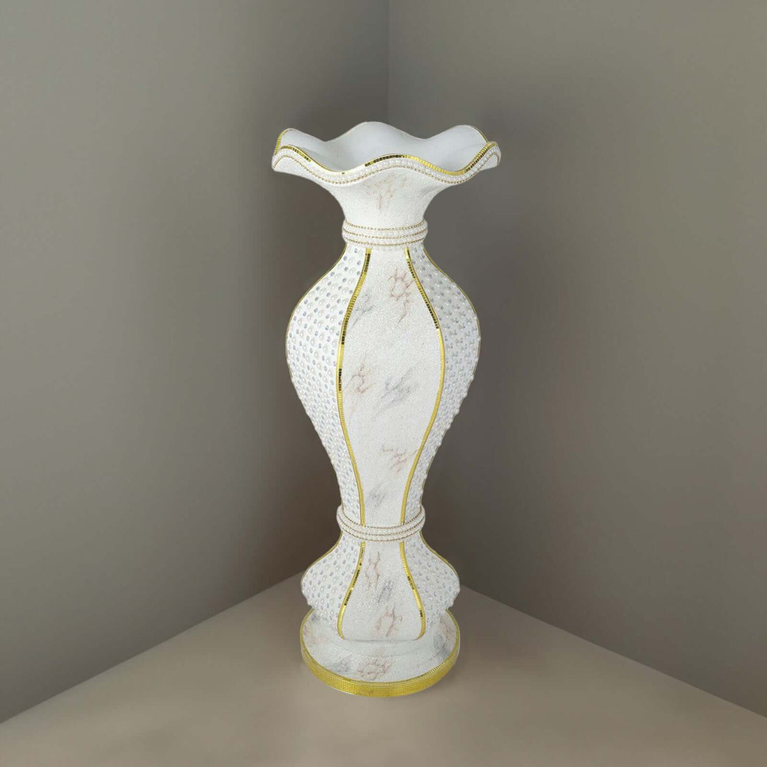 Elegant white vase with gold accents and textured design.