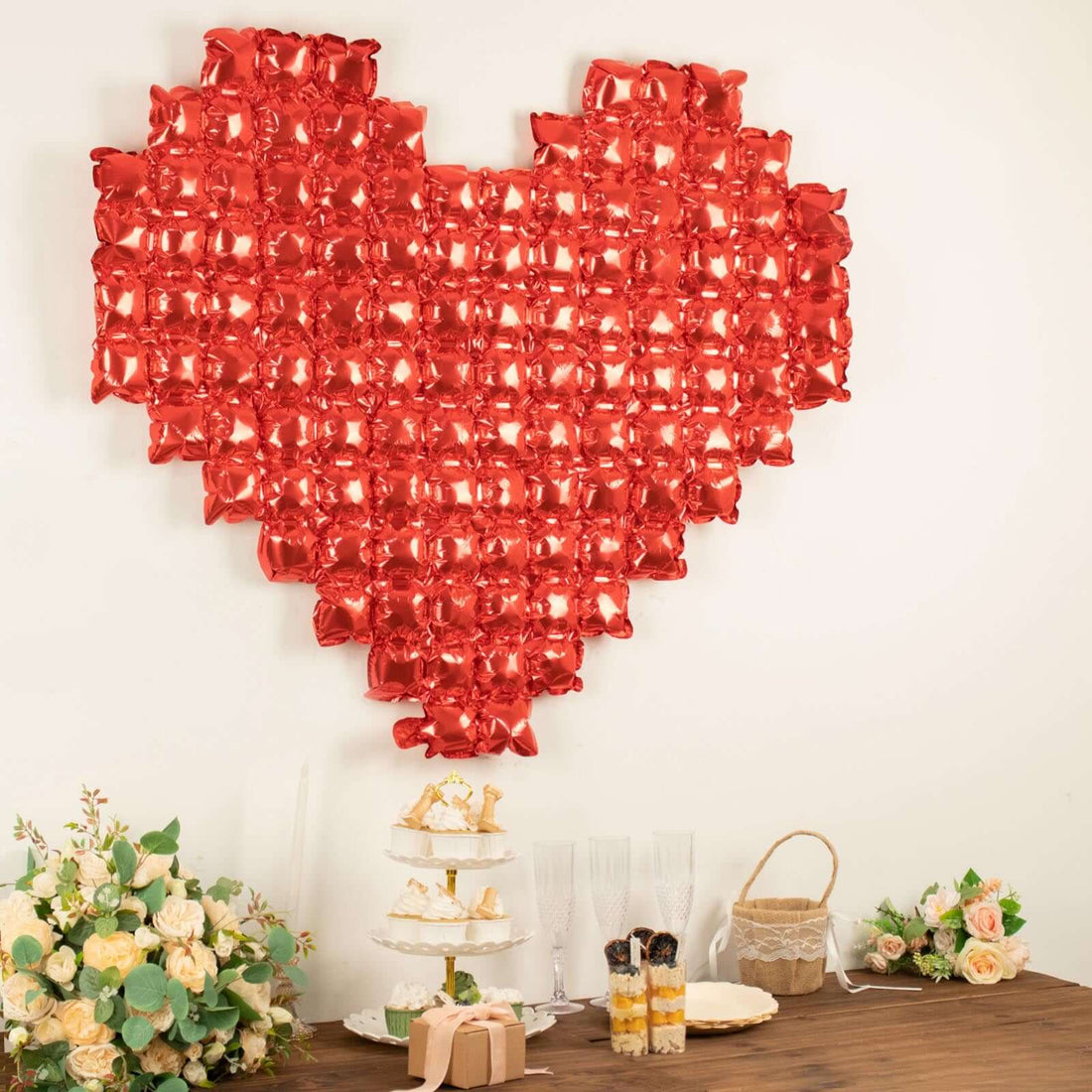 Red heart-shaped balloon decoration for events and celebrations.