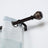 Curtain rod with decorative finial and sheer curtain