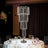 Elegant crystal chandelier table lamp in a luxurious dining setting.