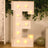 Light-up marquee letter "E" with bulbs, perfect for decor.