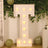 Light-up letter "T" marquee sign with bulbs, ideal for events and decor.