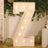 Large illuminated number "7" marquee light with bulbs, perfect for celebrations.