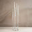 Elegant modern candle holder with multiple glass tubes for stylish decor.