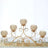 Elegant gold candle holder with crystal accents and five candle cups