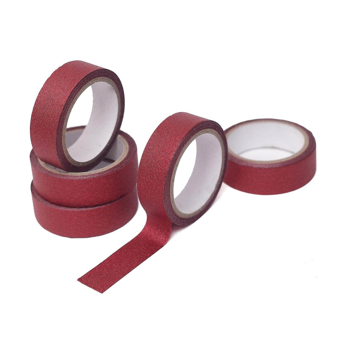 Red glitter washi tape rolls stacked on a white background.