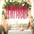 Wedding decoration with pink flowers and a cake table setup.