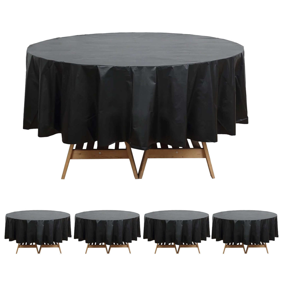 Black round tablecloth on a wooden table.