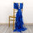 Blue satin chair sash draped elegantly on a gold chiavari chair.