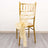 Gold chiavari chair with cream organza sash tied in a bow.
