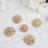 Set of five elegant gold brooches adorned with sparkling rhinestones.