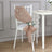Elegant burlap chair sash with flower decoration for wedding or event decor.