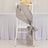 Elegant beige satin chair sash tied in a bow on a white chair.