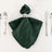 Green satin napkin elegantly styled on a plate with silver napkin ring.