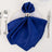 Elegant blue napkin elegantly arranged on a plate with a silver napkin ring.