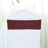 Burgundy chair cover sash on a white chair