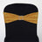 Gold sequin chair sash with rhinestone buckle on a black chair.