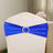 Blue chair cover with rhinestone buckle for elegant decor.