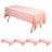 Pink gingham tablecloth draped over a folding table