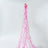Pink curling ribbon rolls with long strands draping down.