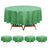 Green round tablecloth on a wooden table