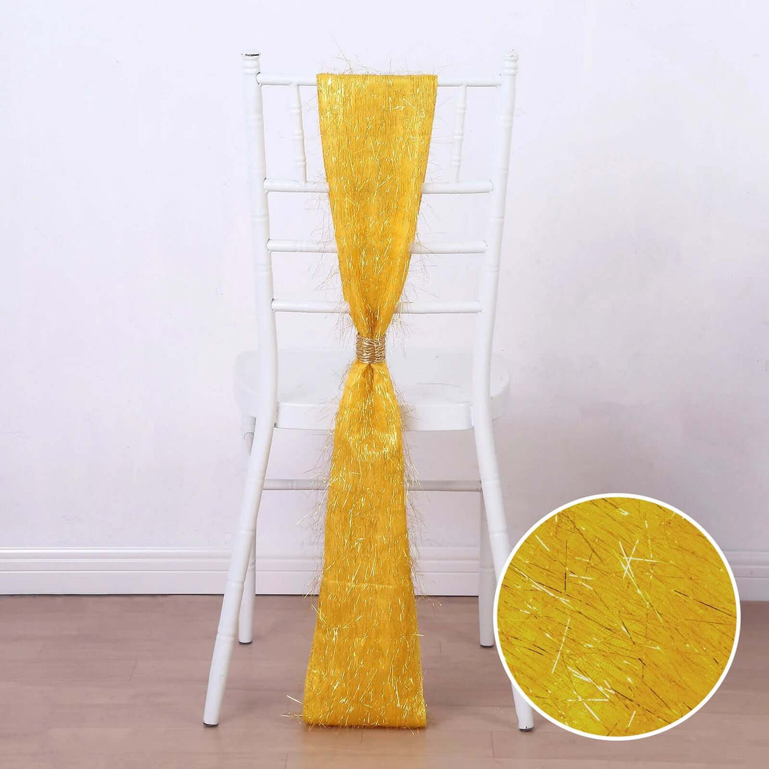 Yellow decorative chair sash with glittery texture, styled on a white chair.