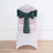 Green chair sash tied elegantly on a white chair.