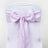 Lavender chair sash with bow and pearl ring detail on a white chair #whtbkgd