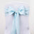 Light blue chair sash with pearl accent on a white backdrop #whtbkgd