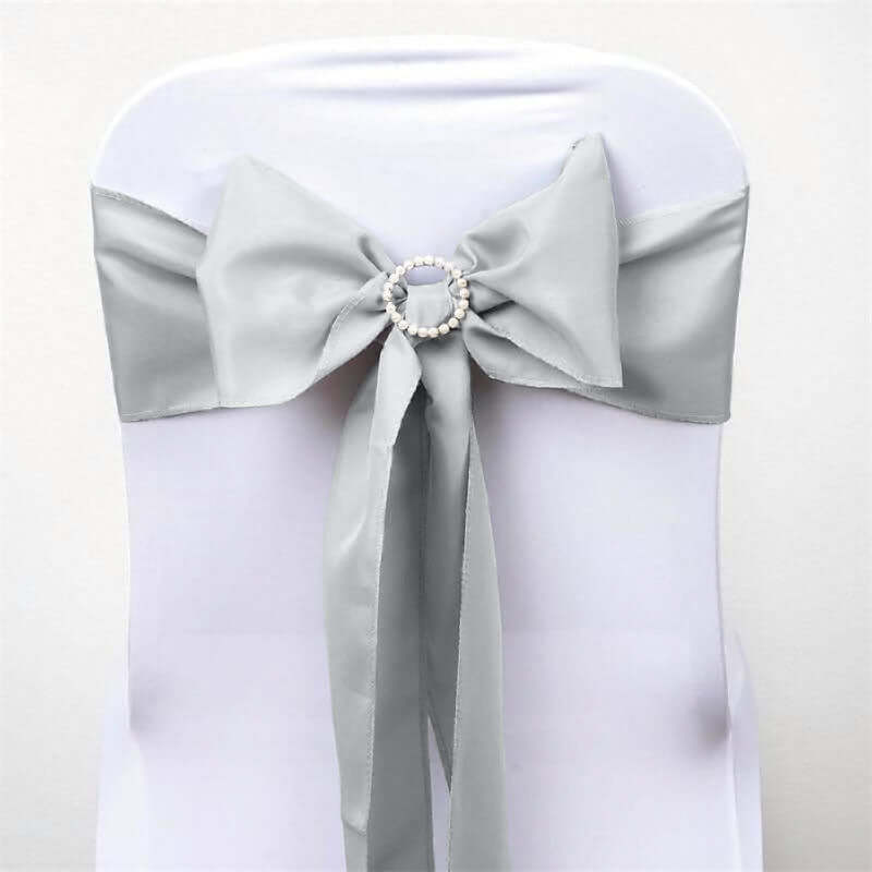 Gray satin chair sash with pearl embellishment. #whtbkgd