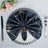 Elegant navy napkin with gold design, beautifully arranged on a plate.