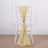 Yellow chiffon chair sash tied on a white chiavari chair.