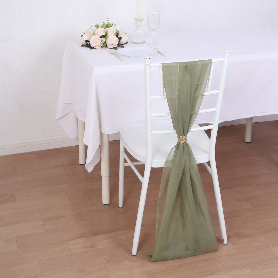 Dusty sage green chiffon chair sashes for soft green event chair styling
