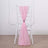 Pink chair sash draped elegantly on a white chiavari chair