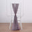 Sheer lavender chair sash draped elegantly on a white chair