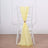 Yellow chiffon chair sash draped elegantly on a white chair.